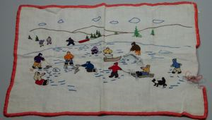 Image: Embroidered place mat with scene of outdoor activities